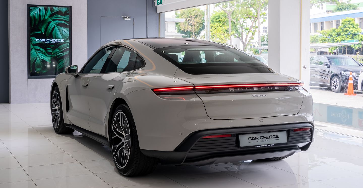 Its silhouette is defined by its sporty roofline sloping downward to the rear